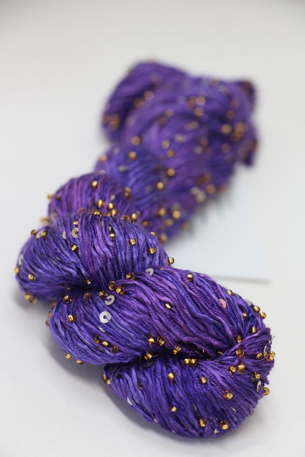 Beaded silk and sequins yarn from Artyarns' Beaded Silk & Sequins Light (H Series), showing colorful beaded fiber with shimmering sequins.