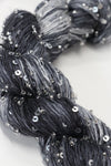Beaded silk and sequins yarn from Artyarns' Beaded Silk & Sequins Light series, showing shiny beads and silky texture.