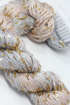 Beaded silk and sequins yarn from Artyarns' Beaded Silk & Sequins Light series, showing shiny beads and delicate fibers.
