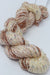 Beaded silk and sequins yarn from Artyarns' Beaded Silk & Sequins Light H Series, showing shiny beads and delicate silk strands.