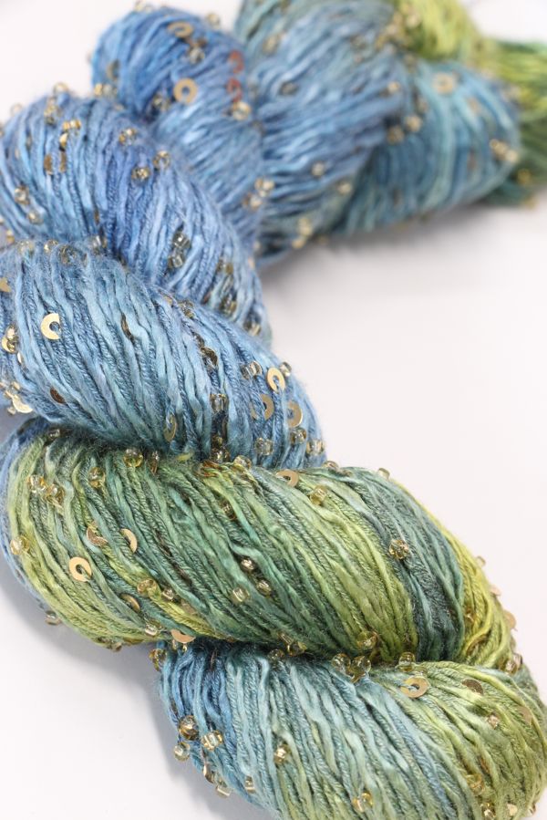 Beaded silk and sequins yarn from Artyarns' Beaded Silk & Sequins Light H Series, showcasing shiny beaded texture and intricate details.