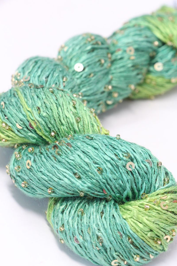 Beaded silk and sequin yarn by Artyarns from the Beaded Silk & Sequins Light H Series, showcasing shiny beads and delicate fibers.