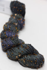 Beaded silk yarn with sequins from Artyarns' Beaded Silk & Sequins Light (H Series), showcasing shimmering beads and luxurious texture.