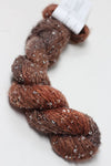 Artyarns Beaded Silk & Sequins Light beaded yarn with shimmering sequins and silk strands in a close-up view.