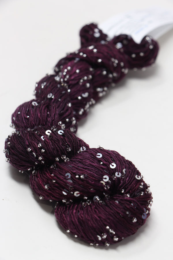 Beaded silk and sequins yarn by Artyarns, light H Series, featuring shimmering beads and sequins for luxurious knitting projects.