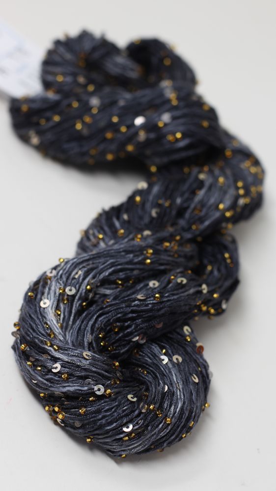 Beaded silk and sequins yarn from Artyarns' Beaded Silk & Sequins Light H Series, showing shimmering beads and delicate silk fibers.