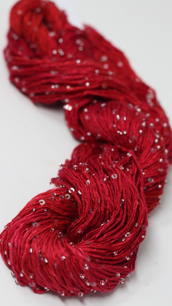 Beaded silk and sequins yarn from Artyarns' Beaded Silk & Sequins Light (H Series), featuring shimmering beads and elegant texture.
