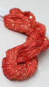 Beaded silk and sequins yarn from Artyarns' Beaded Silk & Sequins Light series, featuring intricate beaded details and shimmering sequins.