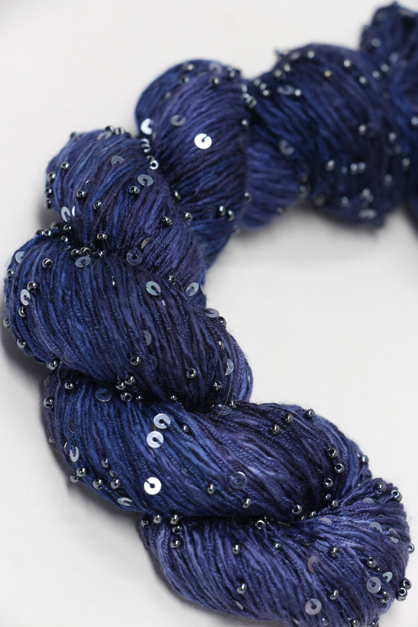 Beaded silk and sequins yarn by Artyarns, H Series, featuring shimmering beads and elegant silk threads for luxurious knitting projects.