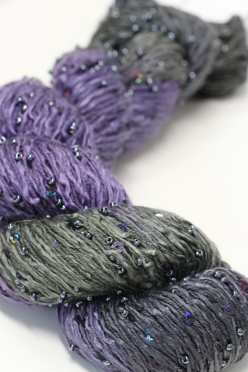 Beaded silk and sequins yarn from Artyarns' Beaded Silk & Sequins Light series, showing shimmering beads and intricate texture.