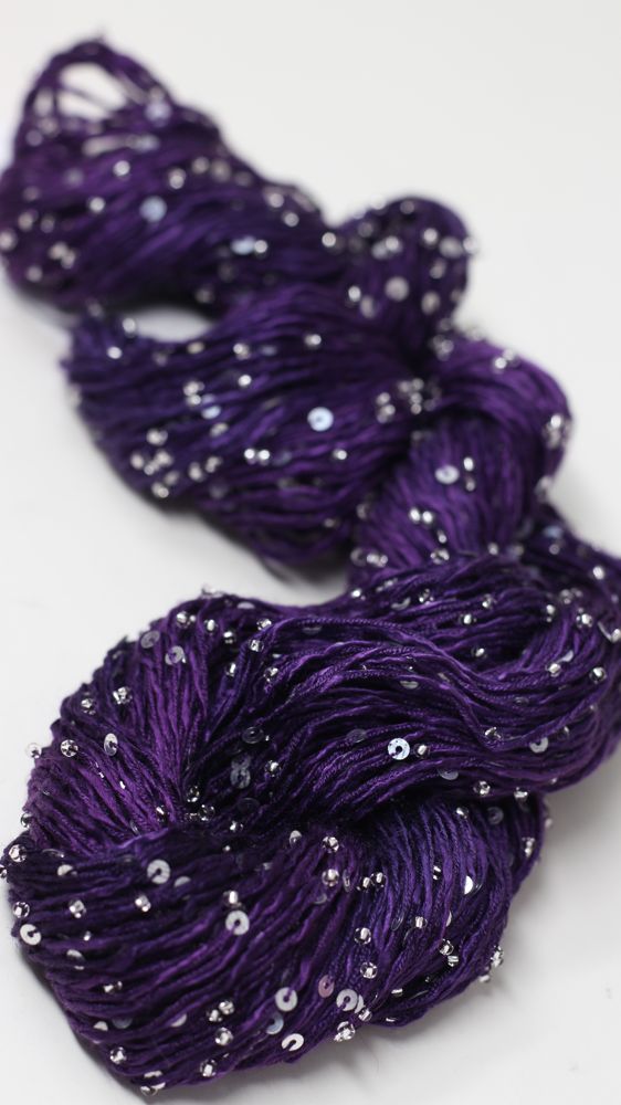 Beaded silk yarn with sequins from Artyarns' Beaded Silk & Sequins Light series, showing shimmering beaded threads and sequins.