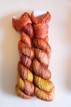 Close-up of Artyarns Regal Silk Yarn in 500 Painters color, showcasing smooth silk fibers and vibrant color details.