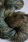 Artyarns Ensemble Light yarn in H Series Cosmic Colors, Forest Greens shade, showcasing vibrant, variegated yarn with lush green tones.