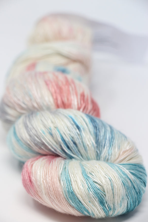 Artyarns Ensemble Light yarn in Cosmic Colors from the H Series, showcasing vibrant, colorful skein of soft, luxurious knitting yarn.