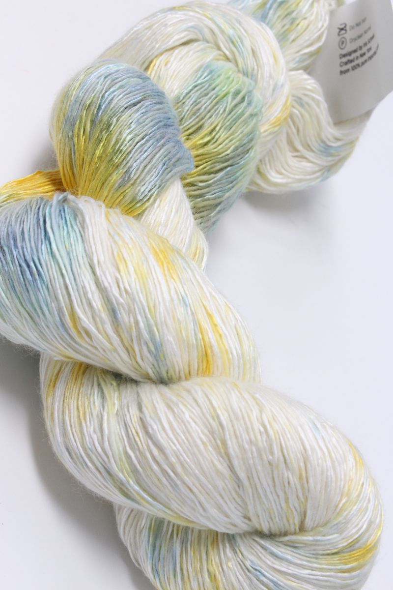 Artyarns Ensemble Light yarn in Cosmic Colors, H Series, 600 Series, with vibrant multicolor skein on a white background.