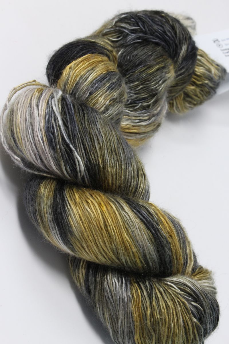 Bright multicolor Artyarns Ensemble Light yarn in cosmic colors, showcasing the soft, textured fiber ideal for knitting and crochet projects.