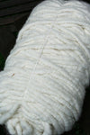 White Bagmith Merino Wool Bumps, soft and textured wool accessories, showcasing the natural wool bumps on a clean white background.