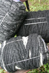 Gray Bagsmith Merino Wool Bumps, soft textured wool product with rounded bumps, ideal for cozy accessories or craft projects.