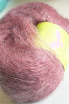 Be Sweet medium brushed mohair yarn in soft ash pink color, showcasing the textured, fluffy fiber suitable for knitting and crochet projects.