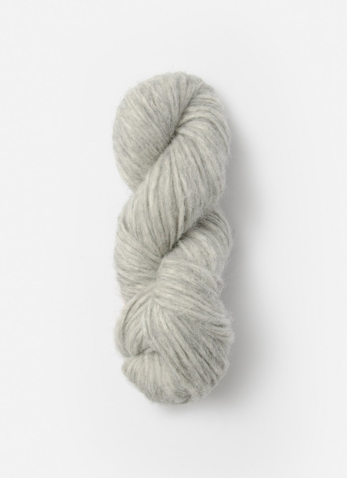 Blue Sky Fibers Techno alpaca, silk, and merino yarn skein showing soft, vibrant blue fibers with a smooth texture and luxurious appearance.