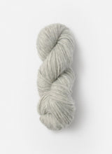 Blue Sky Fibers Techno alpaca, silk, and merino yarn skein showing soft, vibrant blue fibers with a smooth texture and luxurious appearance.