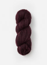 Blue Sky Fibers Techno Alpaca/Silk/Merino yarn in a soft blue color, showcasing the textured fiber blend and skein details.