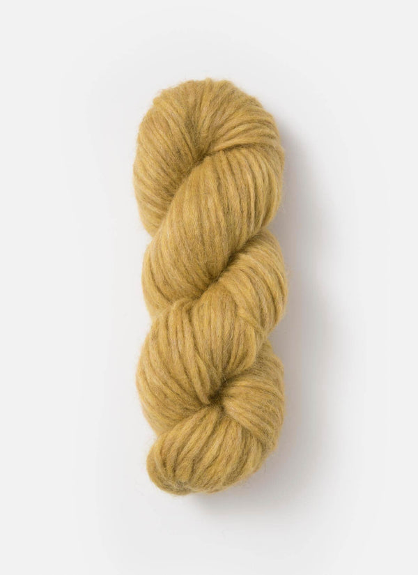 Blue Sky Fibers Techno Alpaca, Silk, and Merino yarn showing soft blue and cream-colored fiber strands.