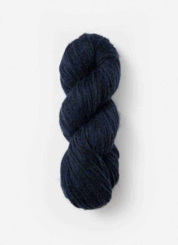 Blue Sky Fibers Techno alpaca, silk, and merino yarn in soft blue, showcasing its smooth, luxurious fiber blend and fine texture.