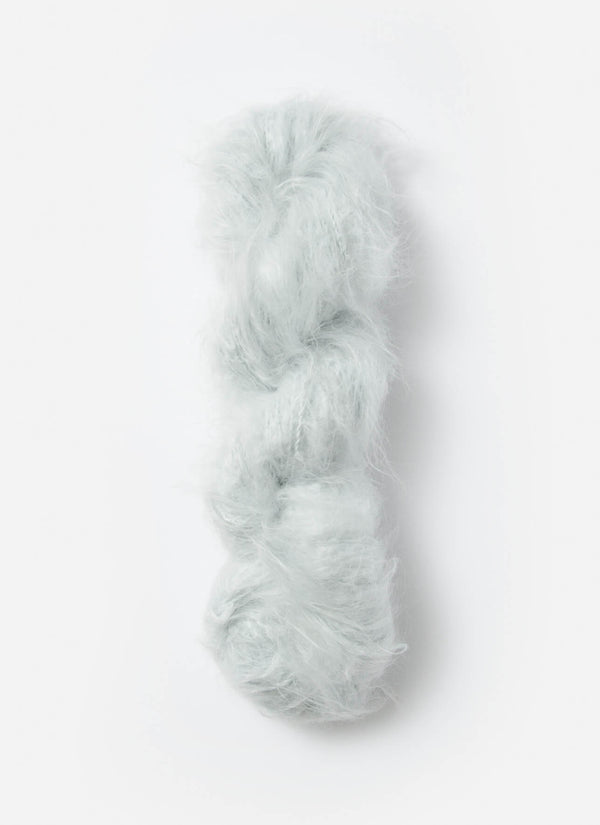 Blue Sky Fibers Brushed Suri alpaca yarn in soft blue with a fluffy, brushed texture for warm, luxurious knitting projects.