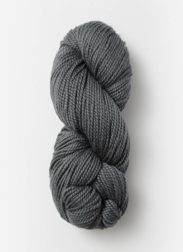 Blue Sky Fibers Extra Alpaca Merino Aran yarn in soft blue, showing thick, cozy alpaca wool skein with textured fibers.