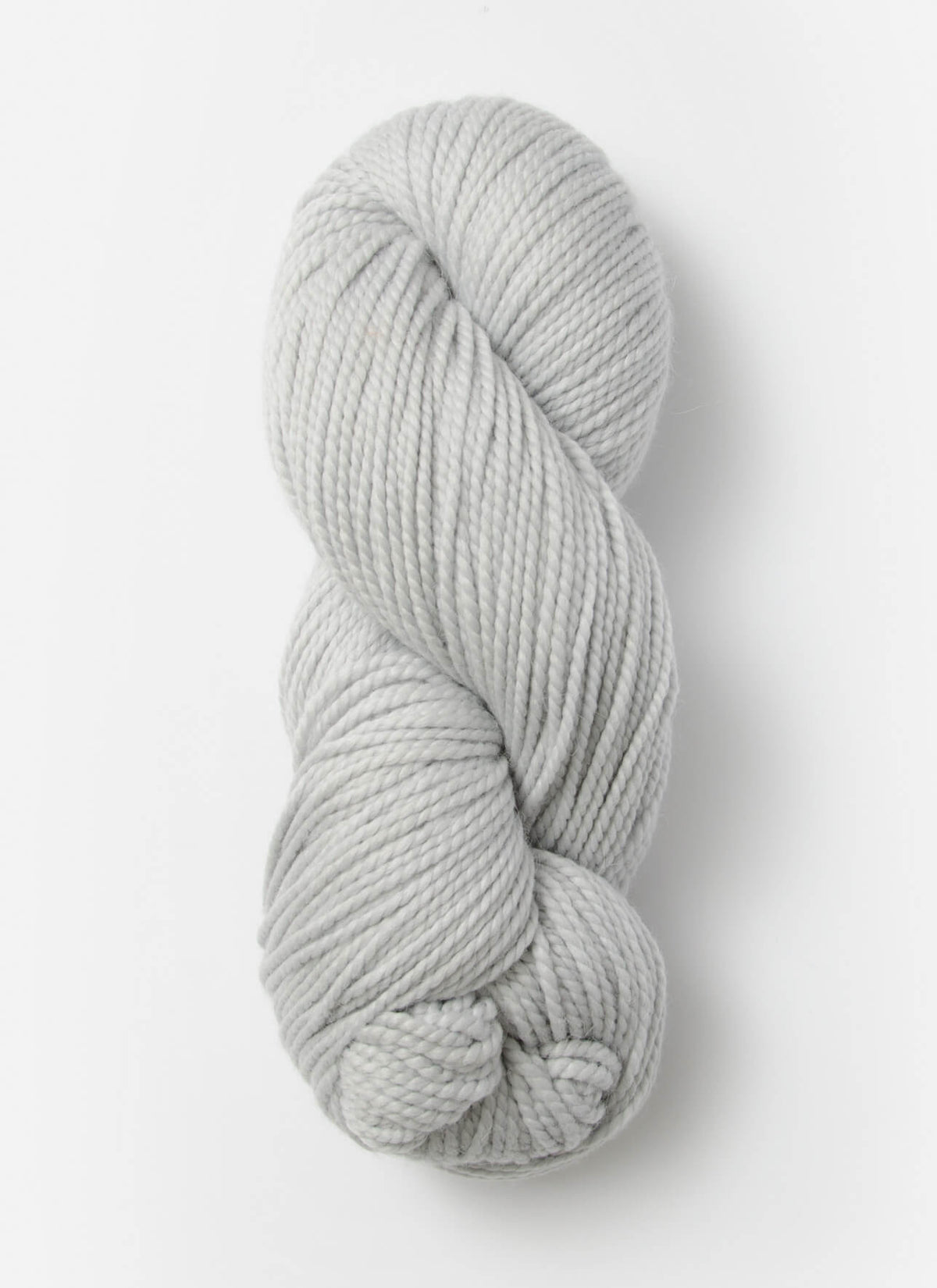 Blue Sky Fibers Extra Alpaca Merino aran yarn in soft blue, showing thick, cozy wool with a smooth texture.
