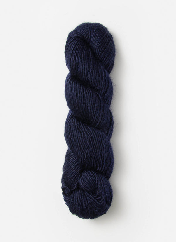 Blue Sky Fibers Suri Merino alpaca yarn in soft blue, showcasing the smooth, luxurious fiber blend and vibrant color.