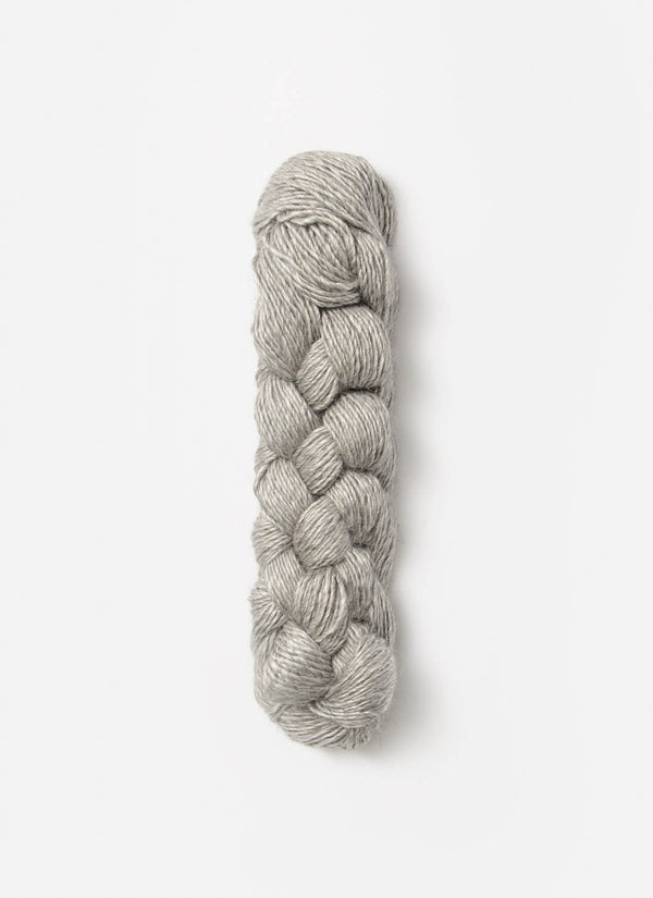 Blue Sky Fibers Metalico alpaca yarn in soft blue, showcasing its smooth texture and rich color for knitting or crafting projects.