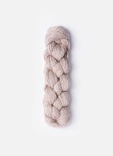Blue Sky Fibers Metalico alpaca yarn in soft blue, showcasing its smooth, shiny texture and rich color.