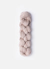 Blue Sky Fibers Metalico alpaca yarn in soft blue, showcasing its smooth, shiny texture and rich color.