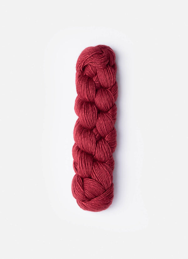 Blue Sky Fibers Metalico alpaca yarn in a soft blue color, showcasing the textured, luxurious fiber with metallic accents.