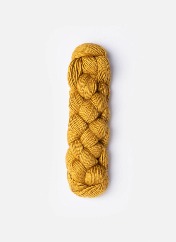 Blue Sky Fibers Metalico alpaca yarn in a soft, metallic blue color, showcasing the textured, luxurious fiber.