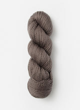 Blue Sky Alpacas Worsted Organic Cotton yarn in solid blue sky color, showing the soft, smooth spun fiber close-up.