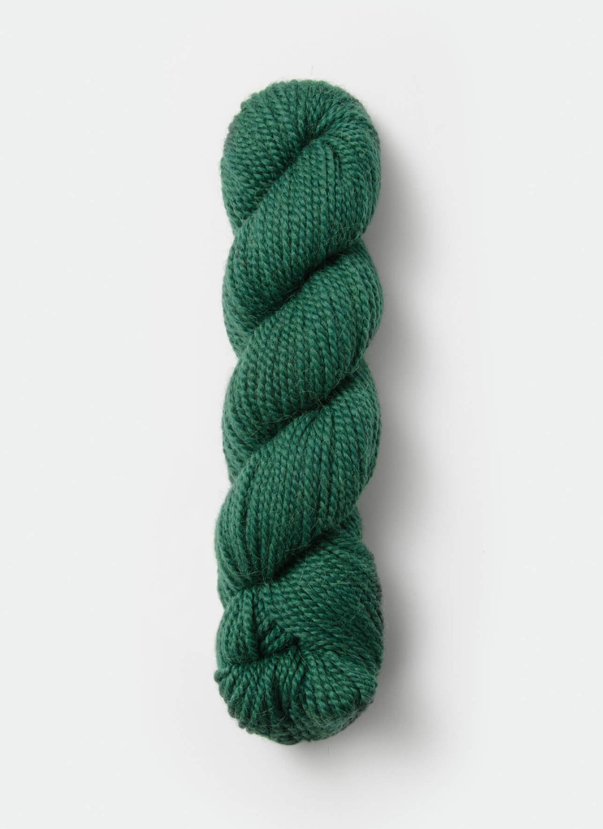 Blue Sky Fibers Baby Alpaca Sport Weight solid alpaca yarn in a soft blue color, shown in a close-up image.