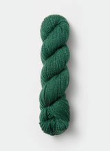 Blue Sky Fibers Baby Alpaca Sport Weight solid alpaca yarn in a soft blue color, shown in a close-up image.