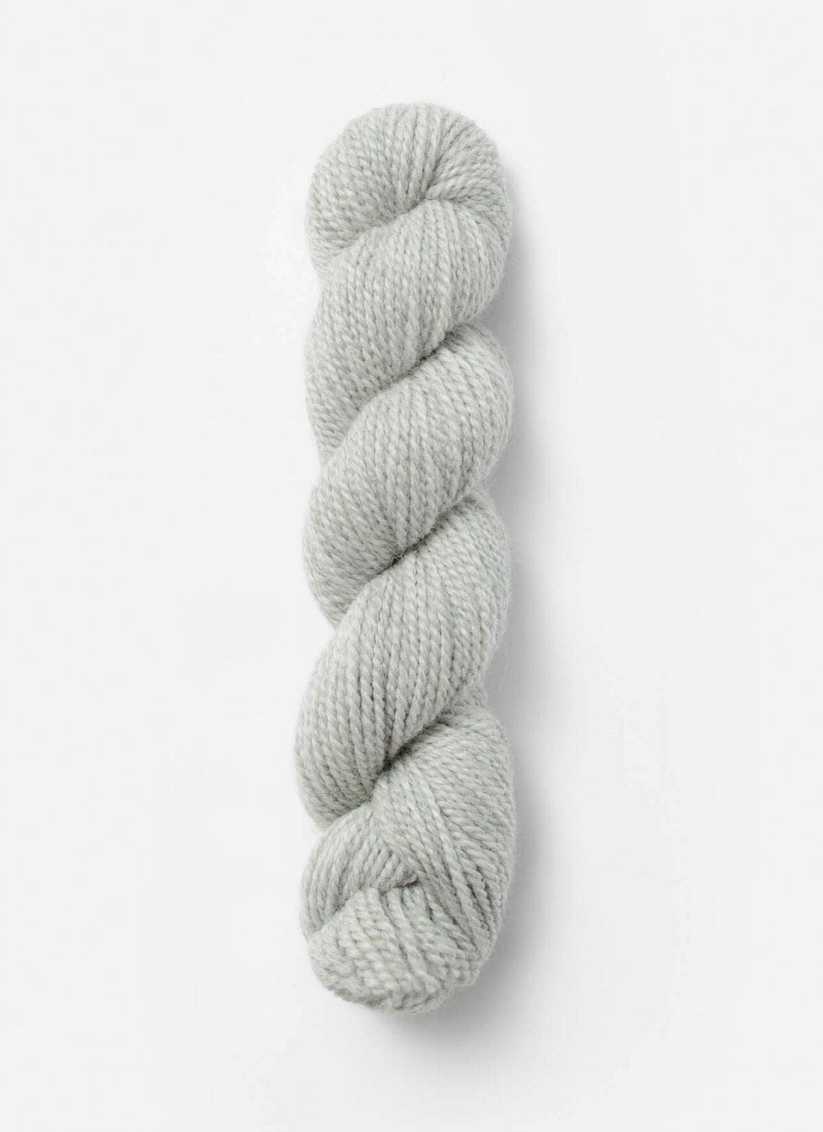 Blue Sky Fibers Baby Alpaca Sport Weight solid alpaca yarn in a soft blue shade, showcasing the smooth, lightweight fiber.