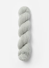 Blue Sky Fibers Baby Alpaca Sport Weight solid alpaca yarn in a soft blue shade, showcasing the smooth, lightweight fiber.