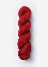 Blue Sky Fibers Baby Alpaca Sport Weight solid alpaca yarn in a soft blue color, showcasing the smooth fiber texture.