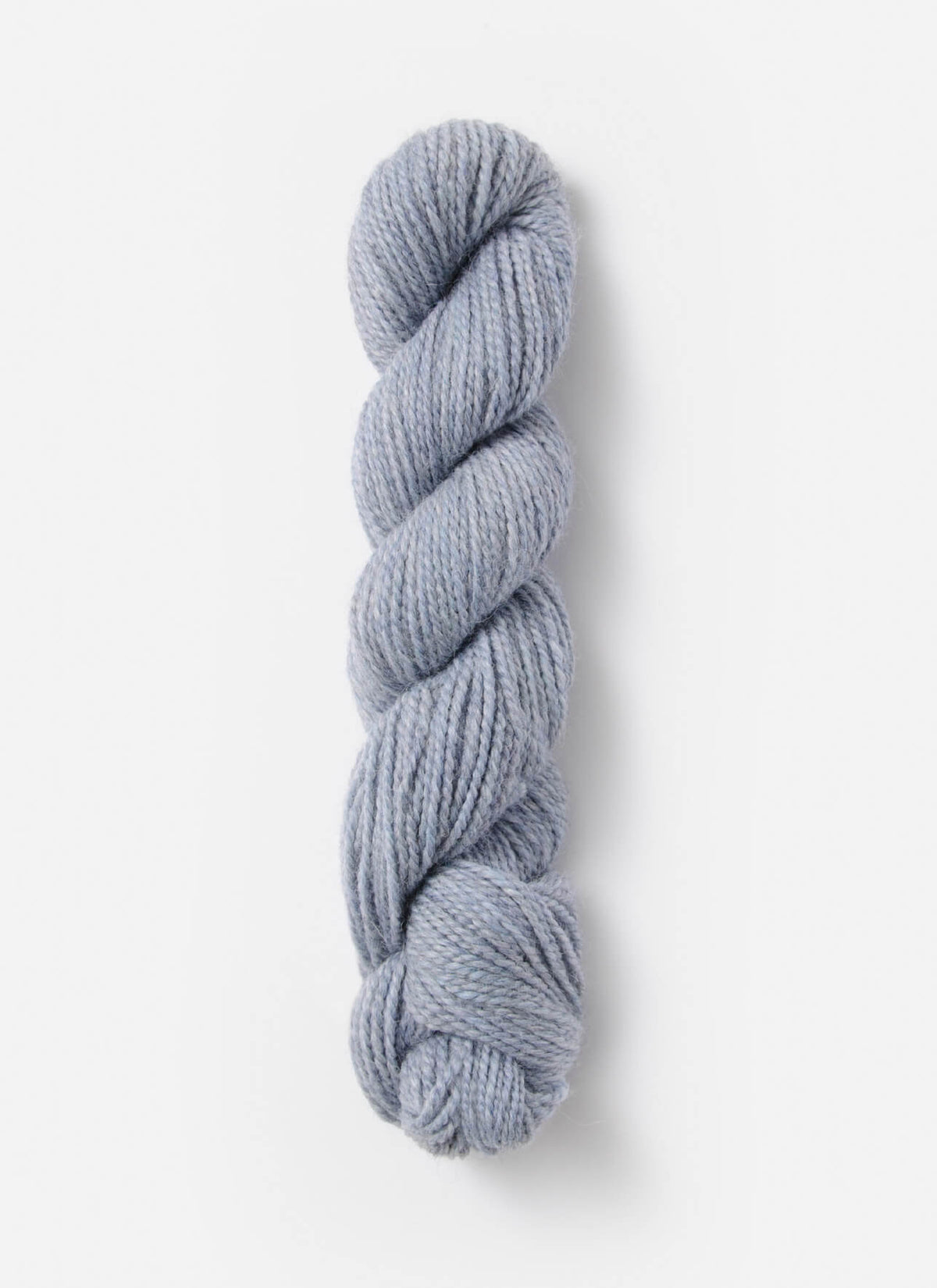 Blue Sky Fibers Baby Alpaca Sport Weight yarn in Melange 800 Series, showing soft, variegated blue and gray alpaca yarn skein