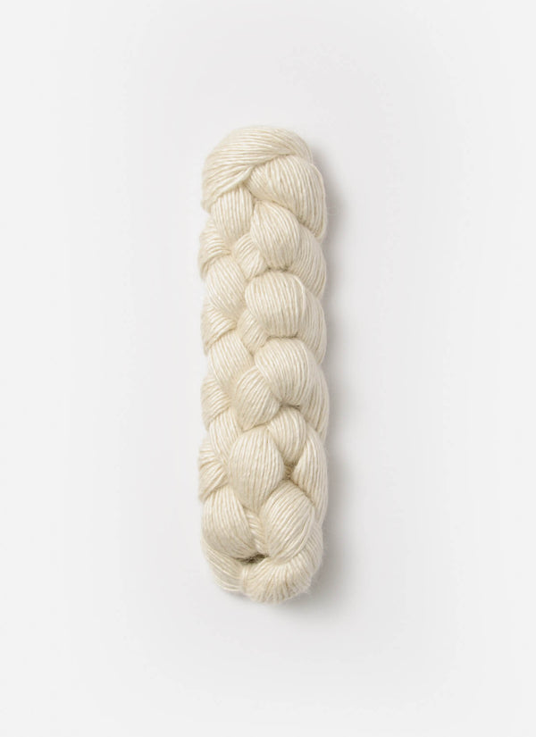 Blue Sky Fibers Metalico alpaca yarn in vibrant blue, showcasing the soft, shiny fiber with a smooth, luxurious texture.