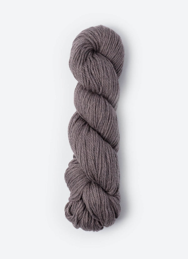 Blue Sky Fibers Sweater Worsted Superwash knitting yarn in vibrant blue, showcasing soft wool and cotton blend fibers.