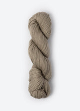 Blue Sky Fibers Sweater Worsted Superwash knitting yarn in soft blue, featuring wool and cotton blend, shown in a skein.
