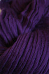 Dark plum Cascade Yarns Magnum bulky yarn ball, showcasing thick, soft yarn ideal for cozy knitting projects.