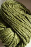 Soft, bulky Cascade Yarns Magnum yarn in vibrant colors, showcasing its thick, cozy texture suitable for warm knitting projects.