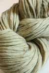 Cascade Yarns Magnum bulky yarn in Sage Flurry color, showcasing thick, soft yarn with a textured appearance.